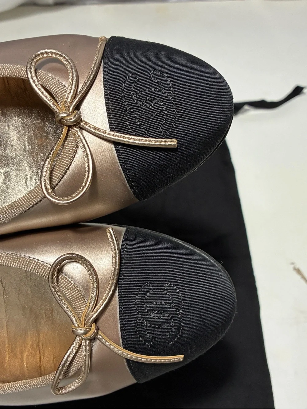 Chanel Two-Tone Ballet Flats in champagne gold and Black
